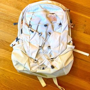 Rose gold and cream North Face backpack!